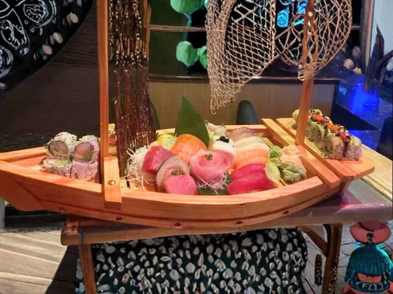 Assorted sushi boat platter with sashimi at Yamato Asian Bistro Inc, a Asian Fusion Restaurant in Spencer
